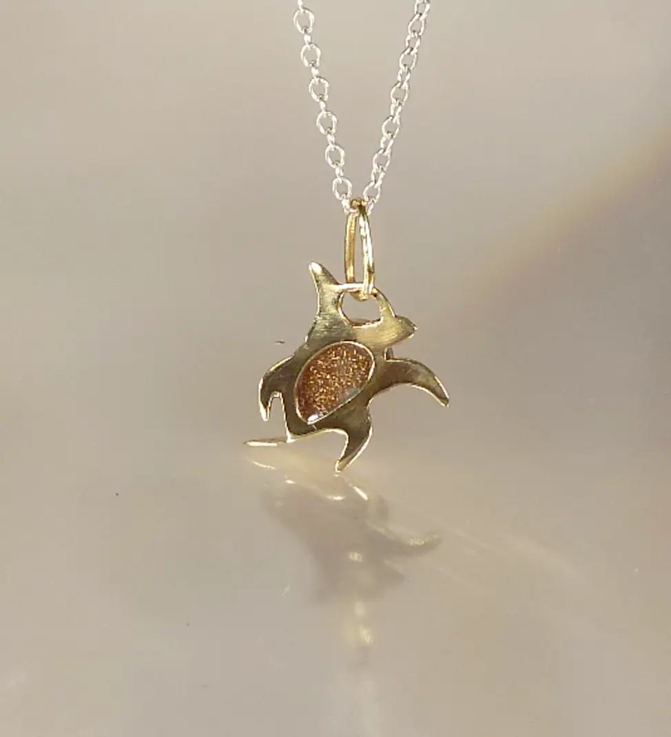 Pendentif tortue de kemp by Cloquille