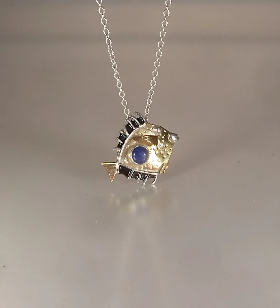 Pendentif Poisson