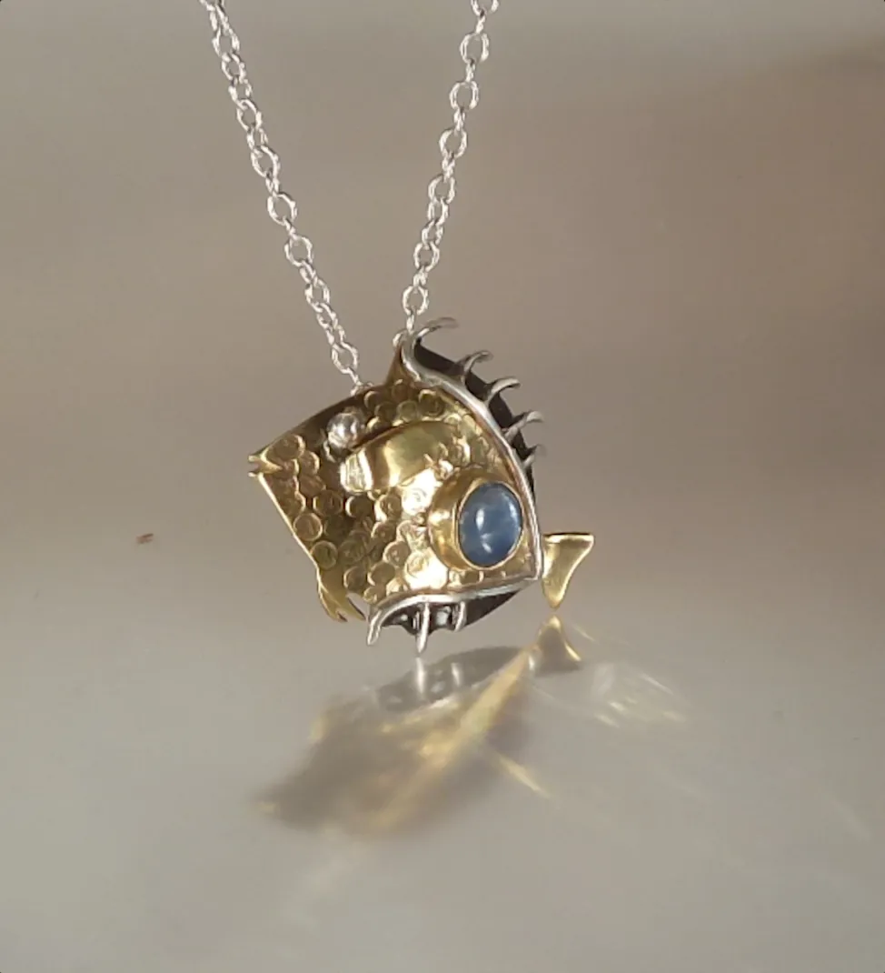 Pendentif poisson