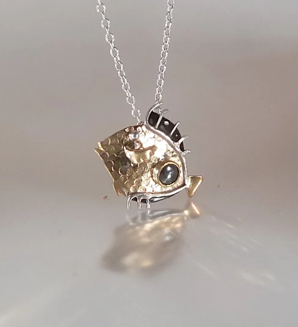 Pendentif poisson